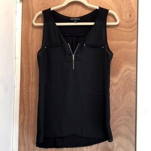 Black tank blouse with adjustable zipper.